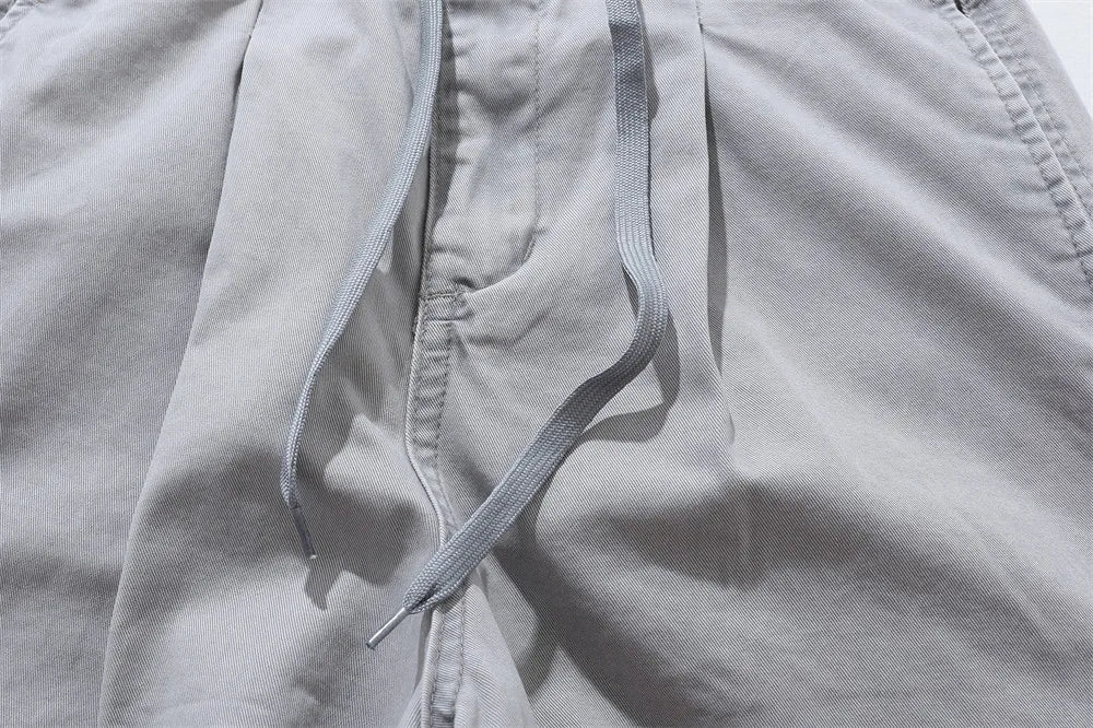 Relaxed Fit Pleated Knee Drawstring Shorts