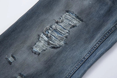 Ripped Fade Denim Jeans