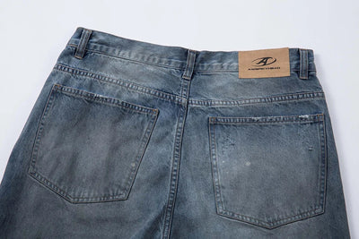 Ripped Fade Denim Jeans
