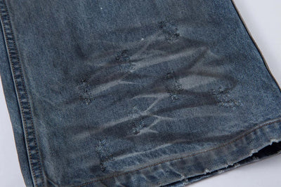Ripped Fade Denim Jeans