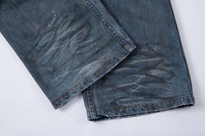Ripped Fade Denim Jeans